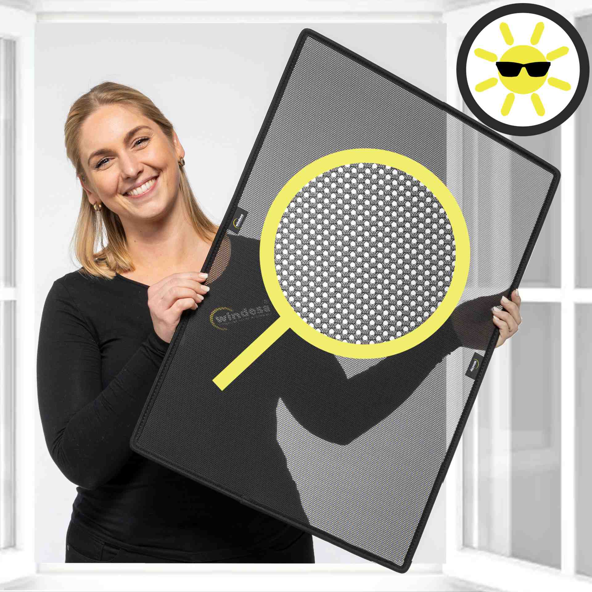 a smiling woman holds the WinClip Cool in her hands